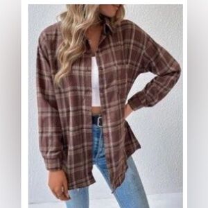 woman’s brown flannel